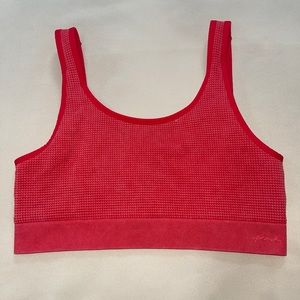 Red vs pink sports bra